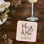Porta-copo De Papel Quadrado Wedding Favor Sr. Sra. Blush<br><div class="desc">Decorre suas mesas de recepção de casamento e dê aos seus convidados de casamento uma lembrança divertida mantendo seu dia especial com estas portas copos cor-de-rosa embaçadas personalizadas com "Sr. & Sra." escrito em um grande roteiro e uma ilustração de dois anéis de casamento juntos. Adicione seu nome e data...</div>