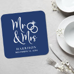 Porta-copo De Papel Quadrado Wedding Favor Sr. Sra. Marinho Blue<br><div class="desc">Decorre suas mesas de recepção de casamento e dê aos seus convidados de casamento uma lembrança divertida mantendo seu dia especial com estas portas copos azuis de marinho escuras personalizadas com "Sr. & Sra." escrito em um grande roteiro branco e uma ilustração de dois anéis de casamento juntos. Adicione seu...</div>