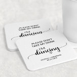 Porta-copo De Papel Redondo Caligrafia simples Não tome minha bebida Estou dan<br><div class="desc">Esta simples porta copos de caligrafia "por favor,  não tome minha bebida que estou dançando" é perfeita para uma simples recepção de casamento. A design minimalista apresenta uma elegante letra de escrita de pincel e um adorável coração feminino.</div>