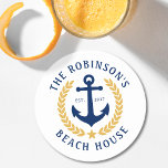 Porta-copo De Papel Redondo Nome da família Beach House Anchor Dourada Laurel<br><div class="desc">Um conjunto na moda náutico de portas copos de papel com seu nome de família personalizado e casa de praia, casa de lago ou outro texto desejado e data estabelecida. Possui uma âncora de barco personalizada, com folhas de ouro estilo laurel e uma estrela em branco ou personalize facilmente a...</div>
