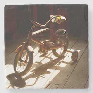 Porta-copo De Pedra Bicicleta infantil na antiga moenda