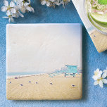 Porta-copo De Pedra Cabine salva-vidas do oceano de praia da Califórni<br><div class="desc">Relaxe com a sua bebida favorita nesta incrível porta copos de pedra monográfica personalizada, colorida em pastel, enquanto você se lembra do cheiro fresco de sal do ar do oceano. Exalar e explorar a solidão de uma praia vazia da Califórnia. Faz um presente excelente para o lar! Você pode personalizar...</div>