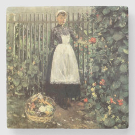 Porta-copo De Pedra Garota com cesta de vegetais em um jardim