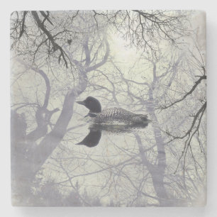 Porta-copo De Pedra Leão preto e branco sobre uma porta copos     mar