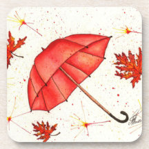 Guarda-chuva vermelha brilhante e folhas vermelhas