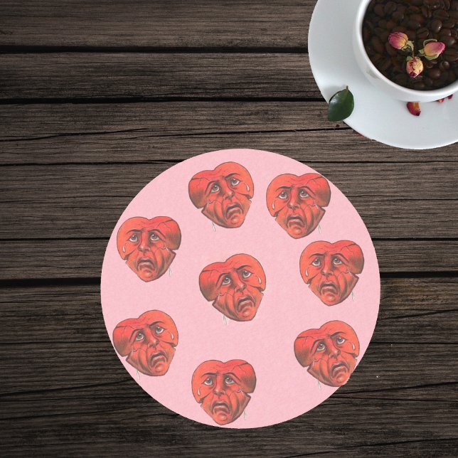 Porta-copos De Arenito Círculo de Rostos Vermelhos de Choro Surreal (Red hearts with sad crying faces on light pink glass drink coaster.)