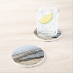 Porta-copos Morro Bay California Ocean Photography<br><div class="desc">A foggy overcast day in Morro Bay California with the ocean waves hitting the rocks on the shore in this beach photograph souvenir. This seaside travel photo keepsake coaster gift features black cursive script above the beach rocks and grey sky.</div>