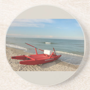 Porta-copos Pattino rosso sulla spiaggia - fotografia de mar