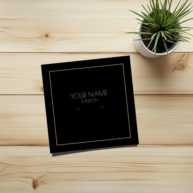 portador negro de borda Dourada (Square black earring display card with thin gold border and text)