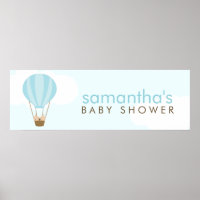 Bebês gêmeos num balão de ar quente verde