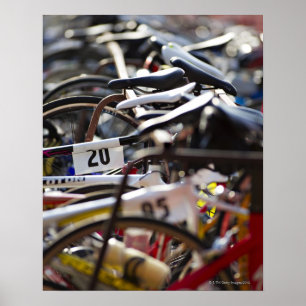 Póster Bicycles on the rack at a triathlon race ready
