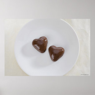 Póster Doces de chocolate dados forma coração em uma