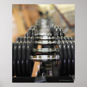 Póster Fim-acima de uma fileira dos dumbbells