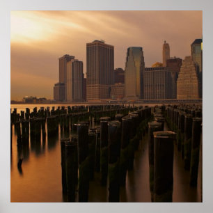 Póster Glow of sunset during stormy skies over East