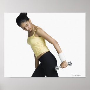 Póster Jovem mulher que exercita com um dumbbell