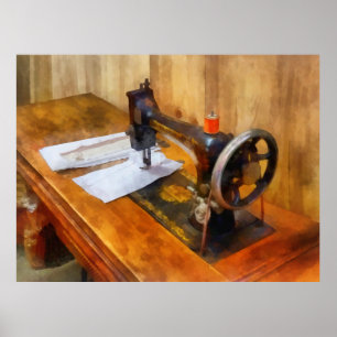 Poster Máquina de costura com linha alaranjada