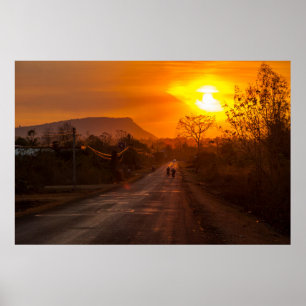 Póster Moto-bicicleta no pôr do sol