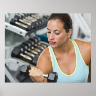 Póster Mulher que exercita com dumbbells