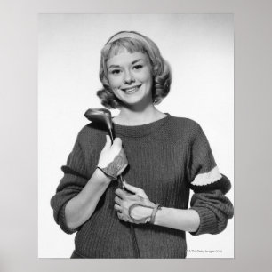 Póster Mulher que guardara o clube de golfe