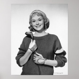 Póster Mulher que guardara o clube de golfe