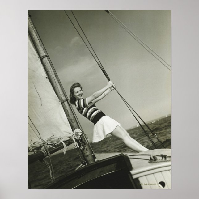 Póster Mulher segurando Rigging em Yacht (Frente)