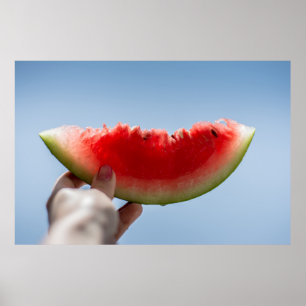 Poster Person holding sliced watermelon