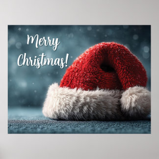 Poster Santa Hat Resting on Snowy Surface with Greeting