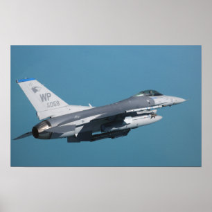Poster Um falcão F-16 de combate em vôo
