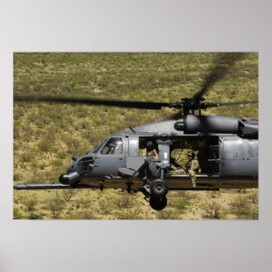 Póster Um HH-60 pavimenta o falcão voa sobre o deserto