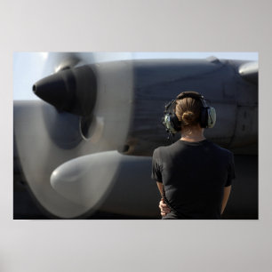 Póster Um soldado monitora o desempenho