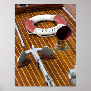 Poster Uma âncora e uma Vida-Bóia em um barco de madeir
