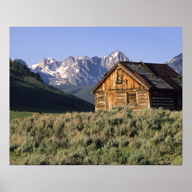 Póster Uma cabana de madeira e as montanhas Sawtooth em (Frente)
