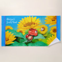 Girassóis sonolentos do joaninha de toalha de