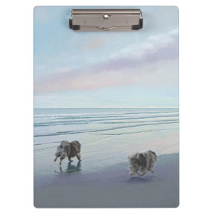 Pranchetas Keeshonds na Arte de Cão de Pintura na costa