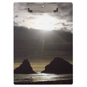 Pranchetas Luz sobre Ocean Rocks Oregon