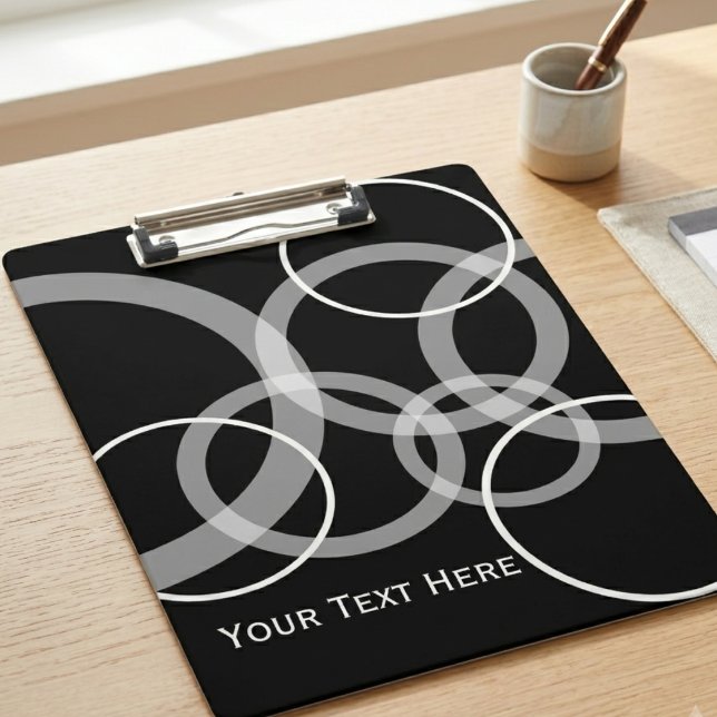 Pranchetas Padrão Moderno de Círculos Entrelaçados Preto e Br (Elevate your desk with this minimalist interlocking circle design; perfect for the organized.)