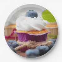 Cupcake delicioso de mirtilo com creme chicoteado