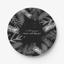 Folhas de pinheiro preto e branco com neve