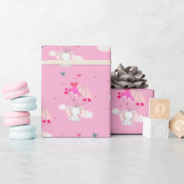 Presente Baby Nelly no papel de enrolamento rosa