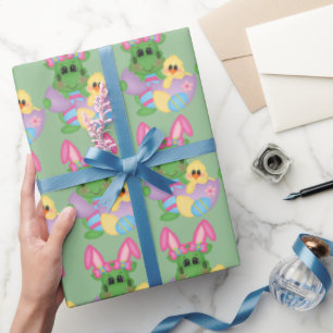 Presente Dragão bonito da páscoa e papel de envolvimento