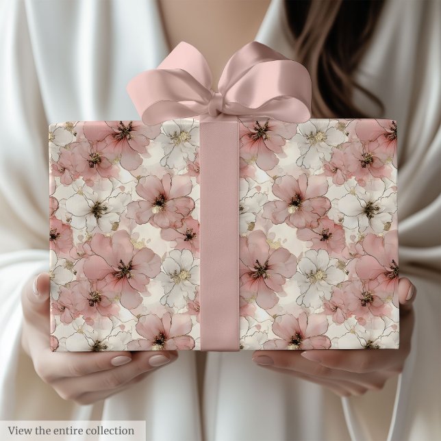 Presente Flores cor-de-rosa elegantes e papel de aniversári (Elegant pink flowers and gold birthday paper wrap)