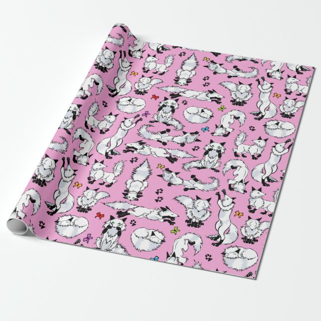 Presente Fox ártico no papel de envolvimento cor-de-rosa (Desenrolado)