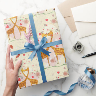 Presente Girafas no papel de envolvimento do amor