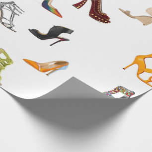 Presente O preto de calçados vermelho bombeia o papel de