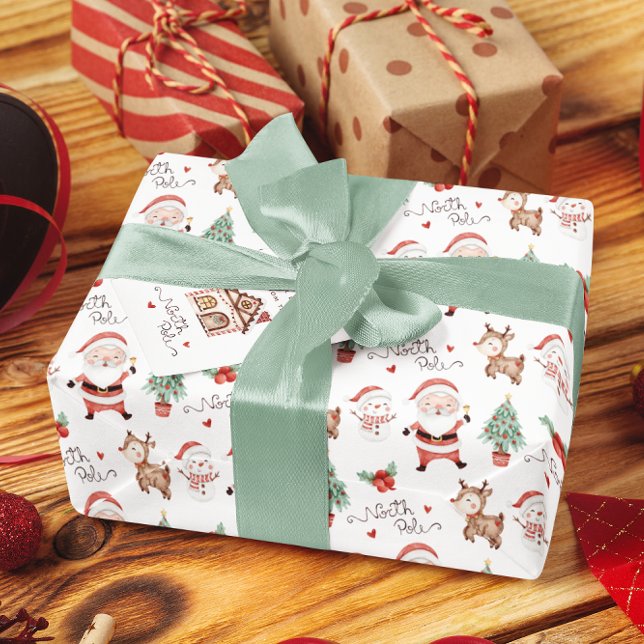 Presente Papais noeis de papel de enrolamento do Polo Norte (Celebrate the holidays with this cute North Pole Santa wrapping paper! )