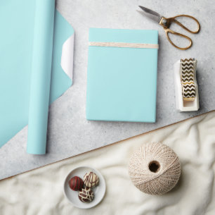 Presente Papel para enrolamento de roupa em turquesa clara