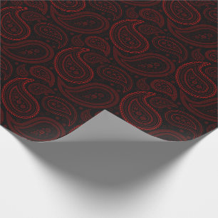 Presente Vermelho de Paisley no papel de envolvimento preto