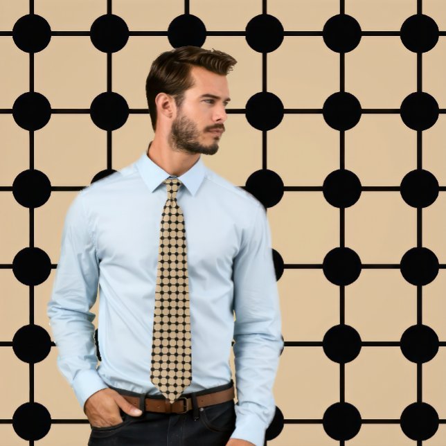 Preto em pontos bronzeados e gravata em grade (Man wears a necktie with a black grid pattern on tan.
)
