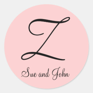 Primeiros nomes e preto inicial no adesivo rosa