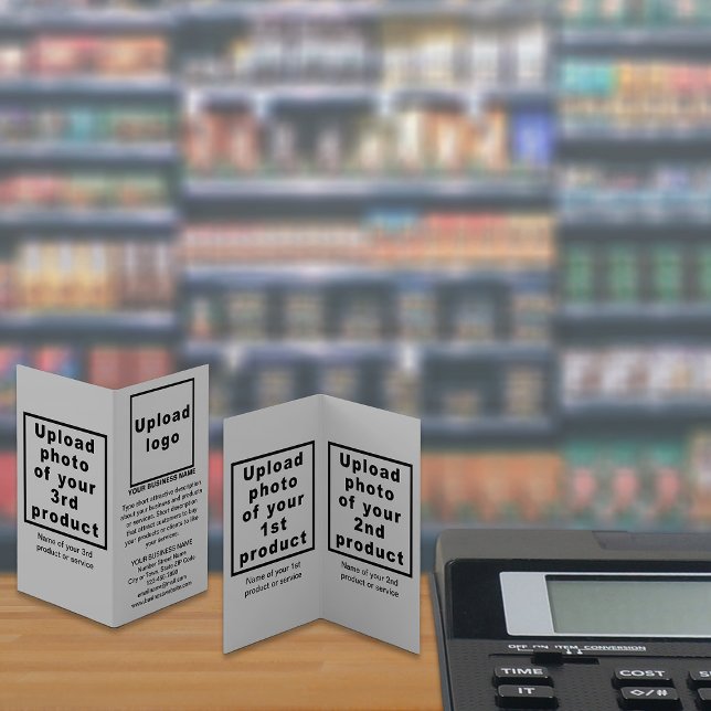 Produtos para empresas em placas dobradas para peq (Your business brand and products or services on small gray folded card displayed in store.)